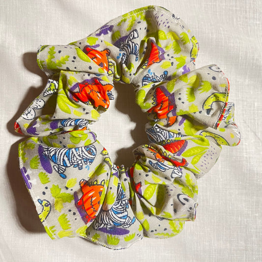 Spooky dinosaur flat lay scrunchie